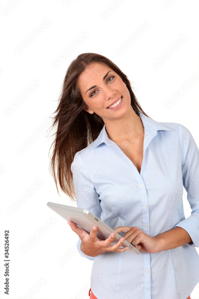 Portrait of beautiful young woman using electronic tablet Portrait of beautiful young woman using electronic tablet