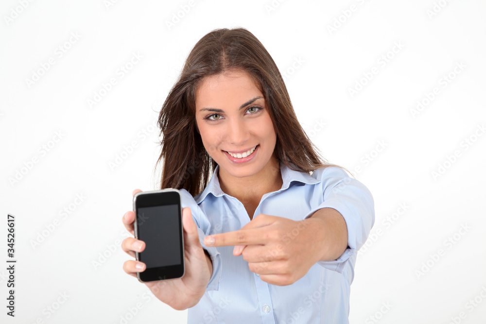 Portrait of beautiful young woman holding smartphone Portrait of beautiful young woman holding smartphone