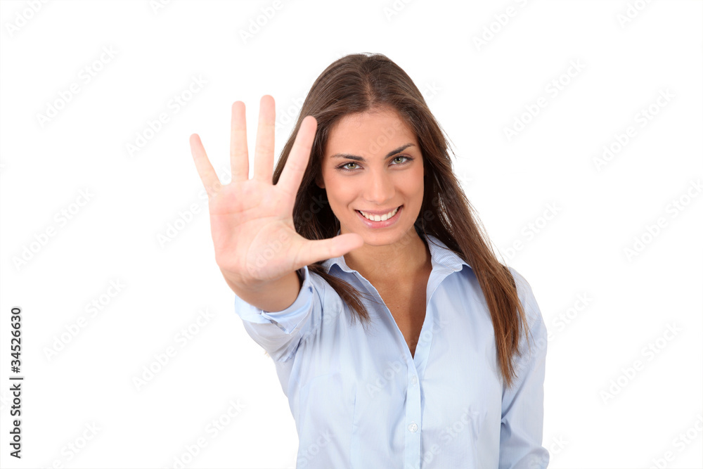 Portrait of girl showing hand to camera Portrait of girl showing hand to camera