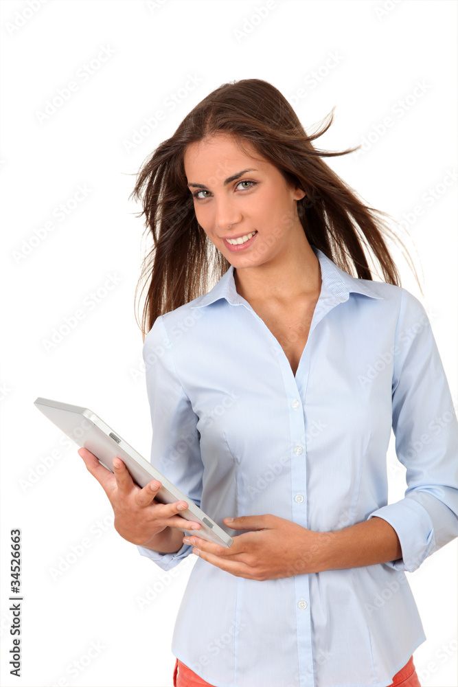 Portrait of beautiful young woman using electronic tablet Portrait of beautiful young woman using electronic tablet