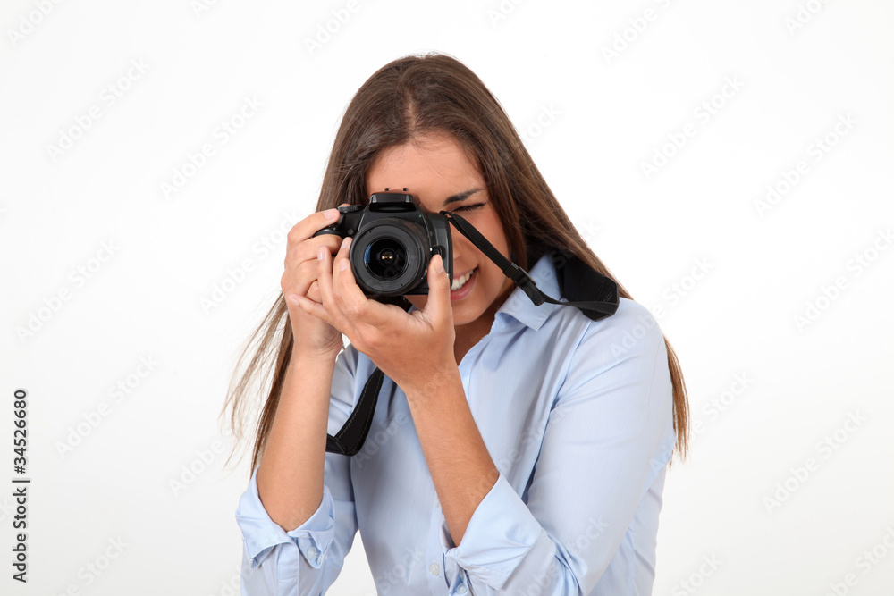 Portrait of woman using reflex digital camera Portrait of woman using reflex digital camera