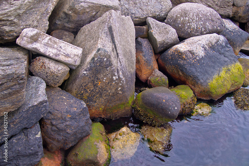 Shore made of rocks in Norwegian fjord