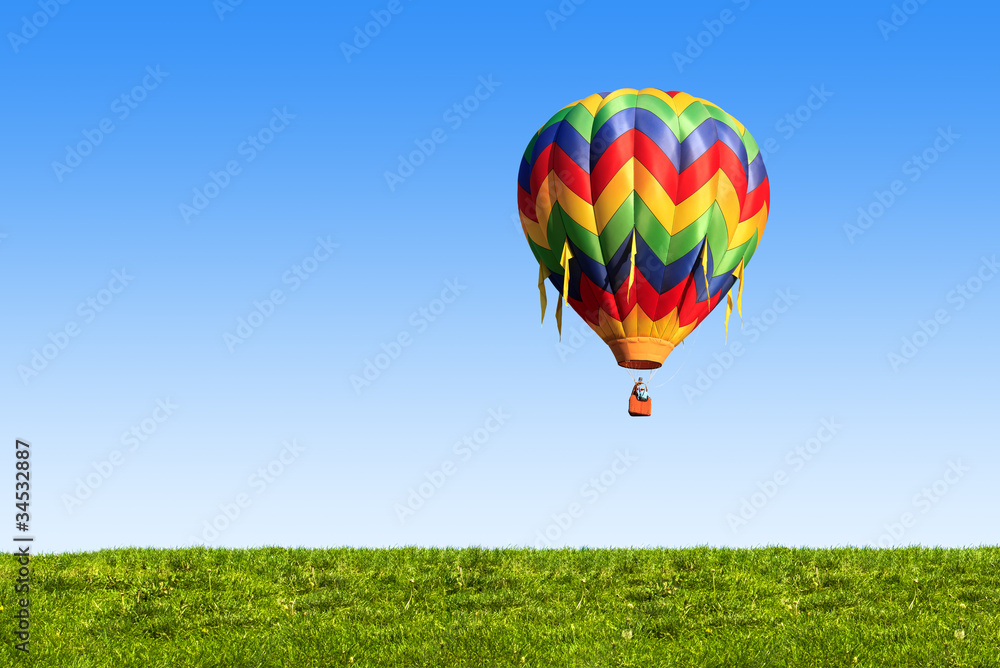 Obraz premium hot air balloon over blue sky