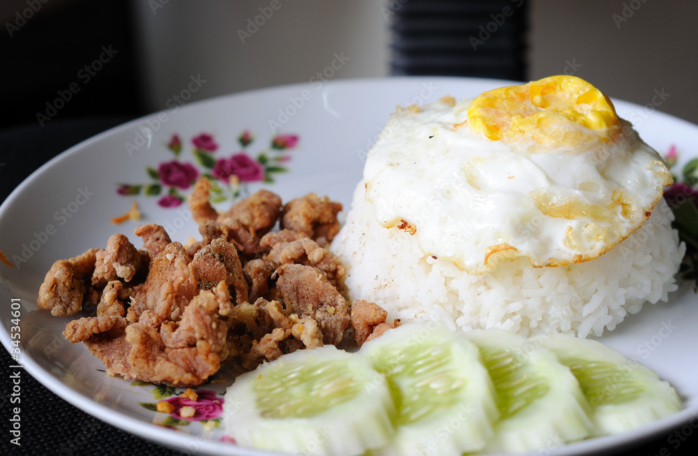 Fried Pork with Garlic Pepper on Rice and fried egg Fried Pork with Garlic Pepper on Rice and fried egg