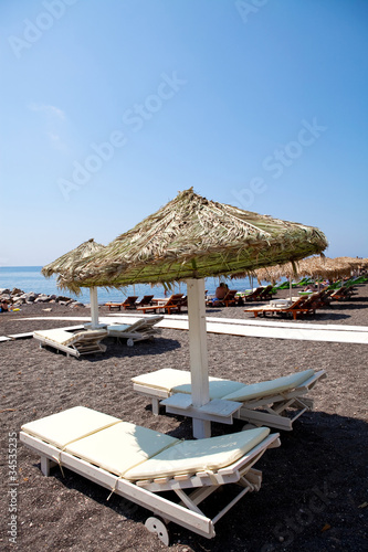 Sunbeds in Perissa  Santorini  Greece