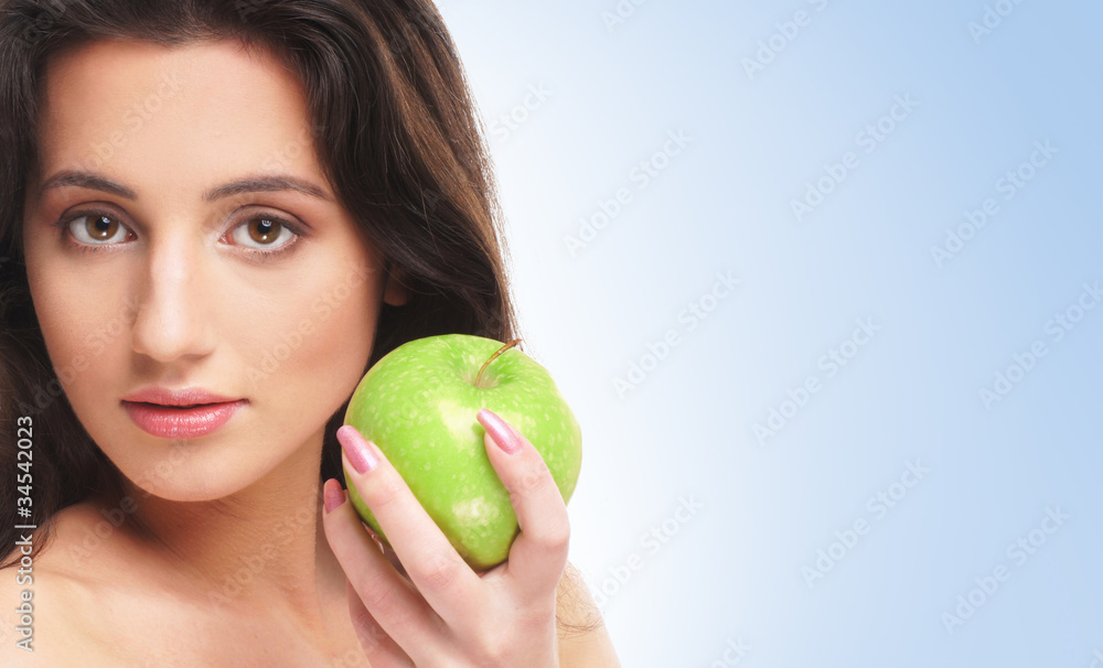 Portrait of young and healthy brunette over blue background Portrait of young and healthy brunette over blue background