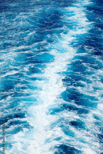 Trail of White and Blue Water Textured Background