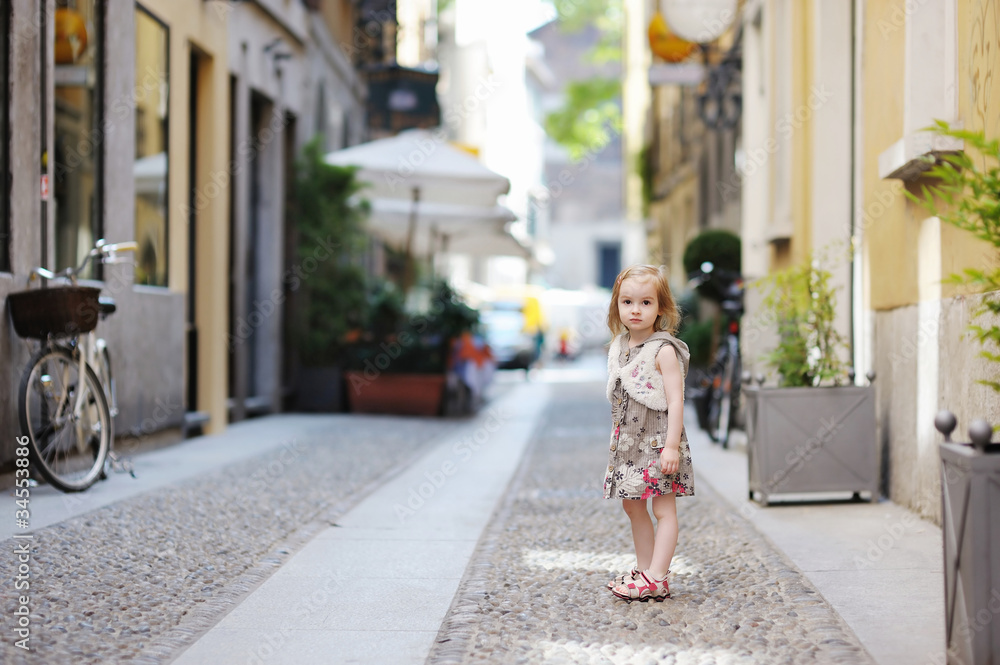 Adorable little girl having fun in a city Adorable little girl having fun in a city