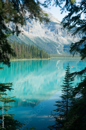 Landscape with trees framing the Emerald Lake