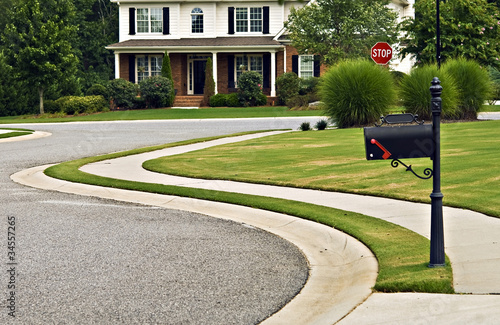 Sidewalk and Street in Modern Neighborhood photo