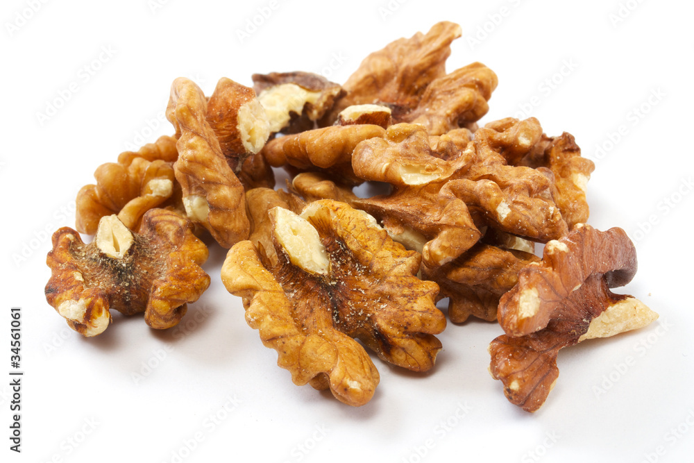Crushed walnuts on white background Crushed walnuts on white background