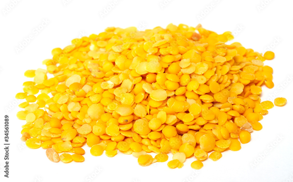 Yellow lentils isolated on white background.Macro shot Yellow lentils isolated on white background.Macro shot