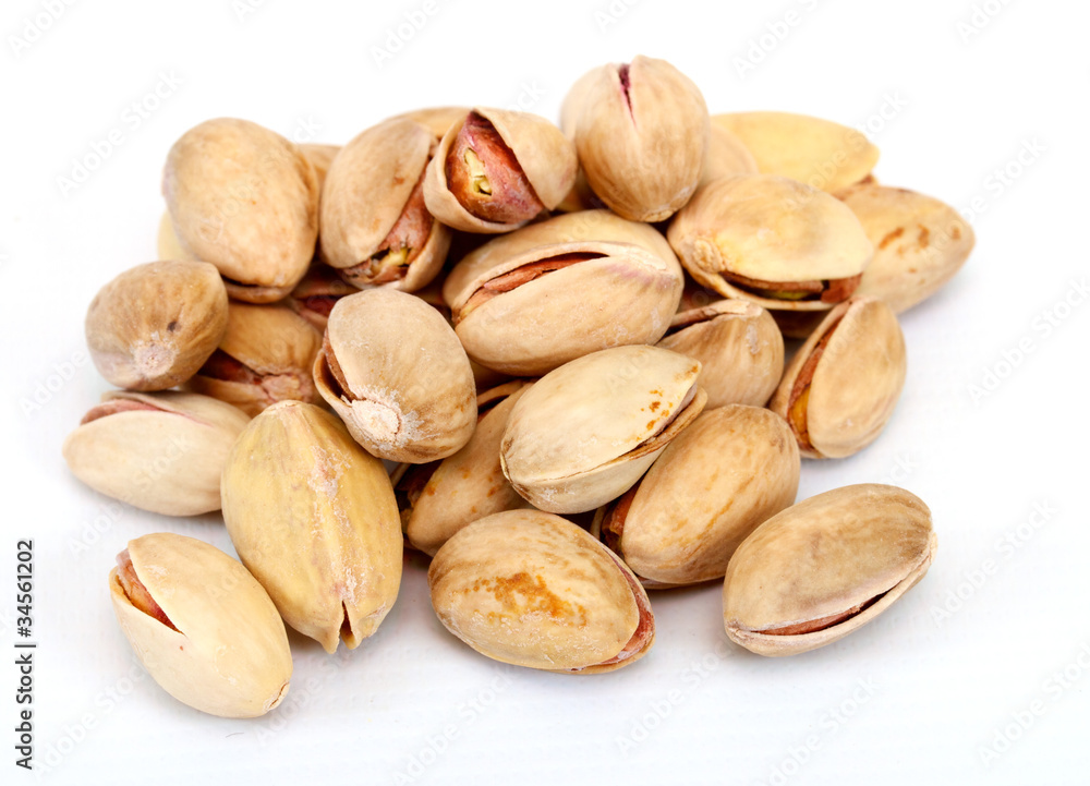 Close-up image of pistachios studio isolated on white background Close-up image of pistachios studio isolated on white background