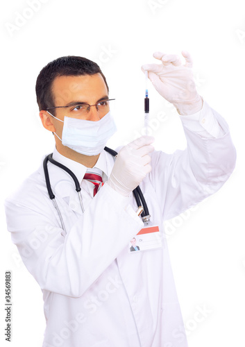 Doctor resarch a medical test syringe with blood.