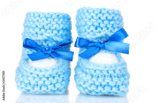 pink baby booties blue isolated on white
