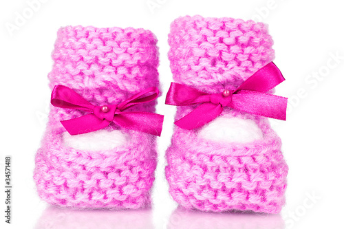 pink baby booties blue isolated on white