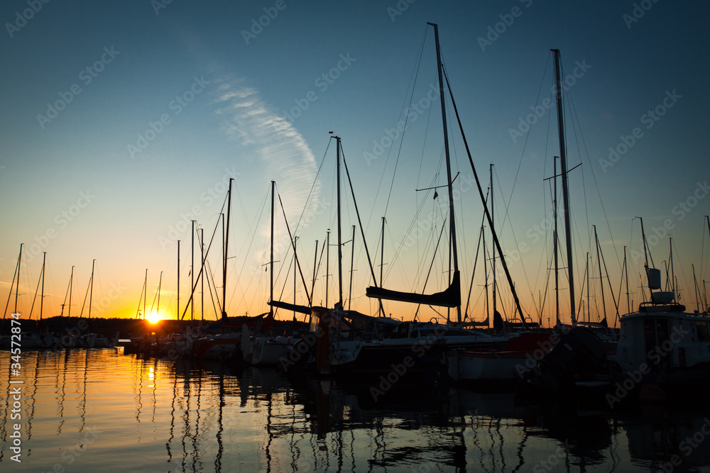 Sunset in luxlury harbour at summer