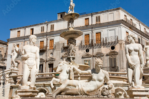 statues of fountain Pretoria in Palermo, Sicily photo