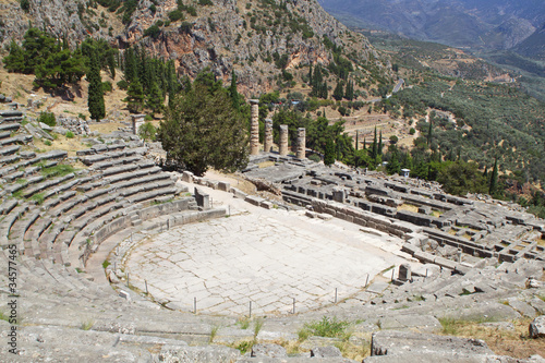 Temple of Apollo and the theater at Delphi in Greece photo