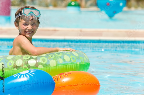 Happy young boy in pool