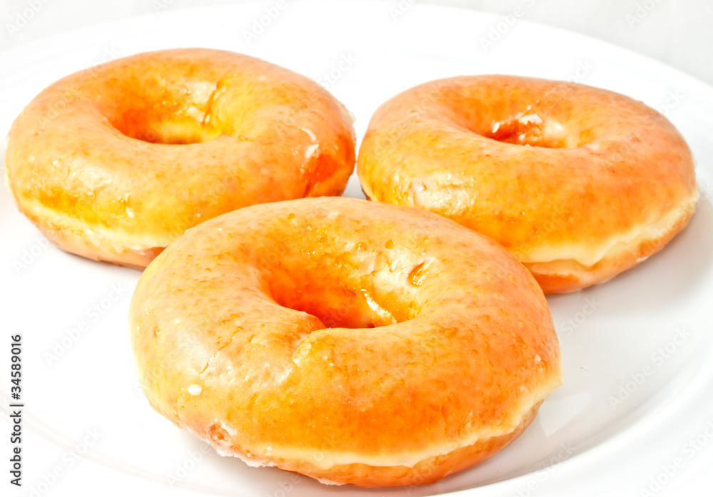 Donuts on white plate