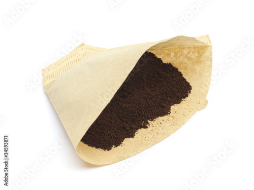 Coffee filter with powder isolated on white