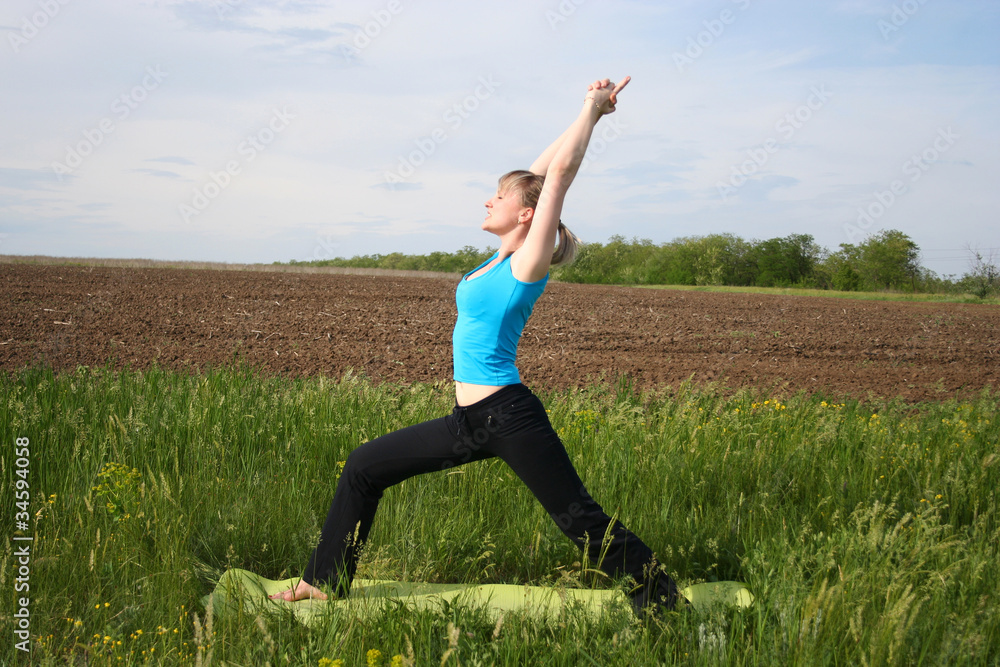 Young woman doing yoga outdoors Young woman doing yoga outdoors