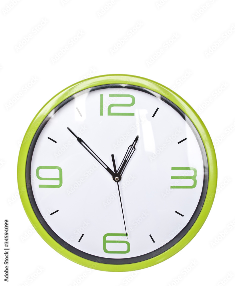 Green wall clock isolated on white