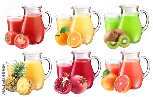 Collection of fresh juices in pitchers.