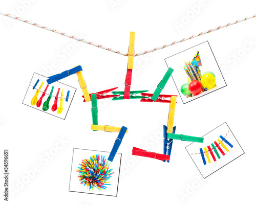 colorful clothespins and photos on a string