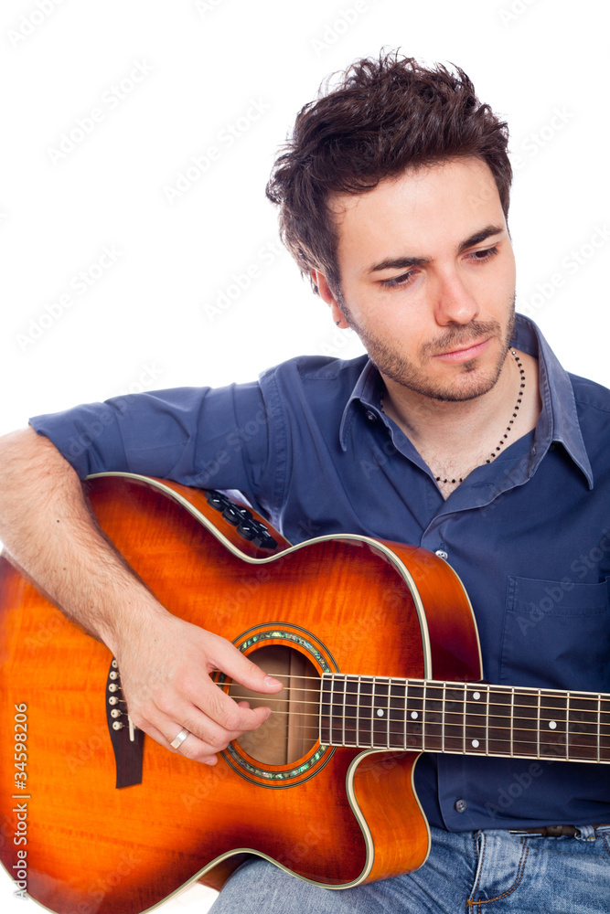 Obraz premium Young Man Playing Guitar