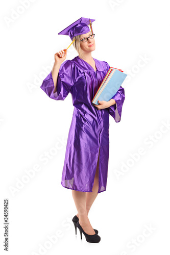 Graduate student in thoughts holding a book