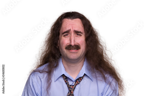 Fotografie Sad long haired man crying with streaming tears1