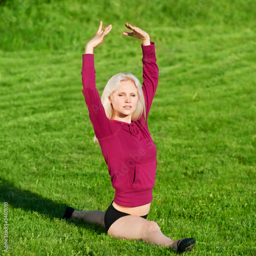 Beautiful woman doing yoga stretching exercise