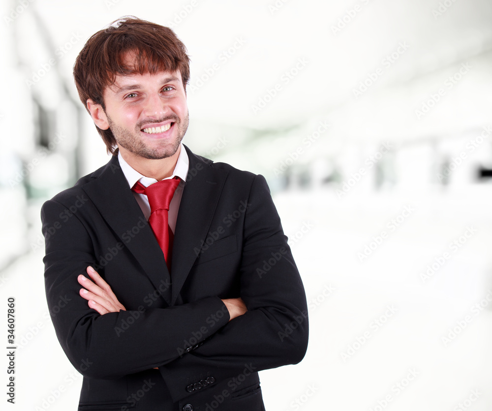 Young businessman smiling