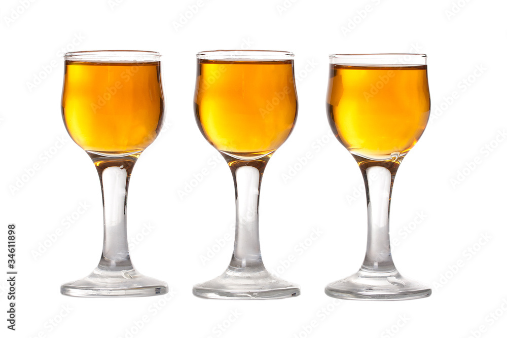glass wine made from honey vodka isolated on white background glass wine made from honey vodka isolated on white background