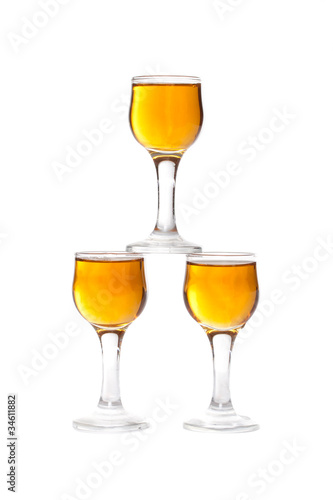 glass wine made from honey vodka isolated on white background