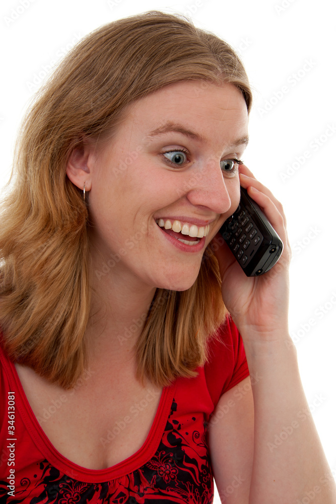 Woman on the phone is very happy over white background