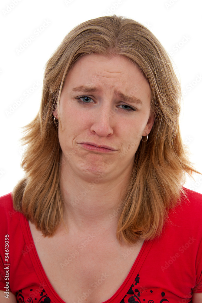 Woman is looking sad over white background Woman is looking sad over white background