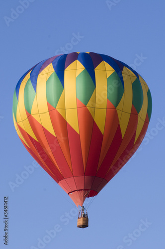 Colorful hot-air balloon against blue sky