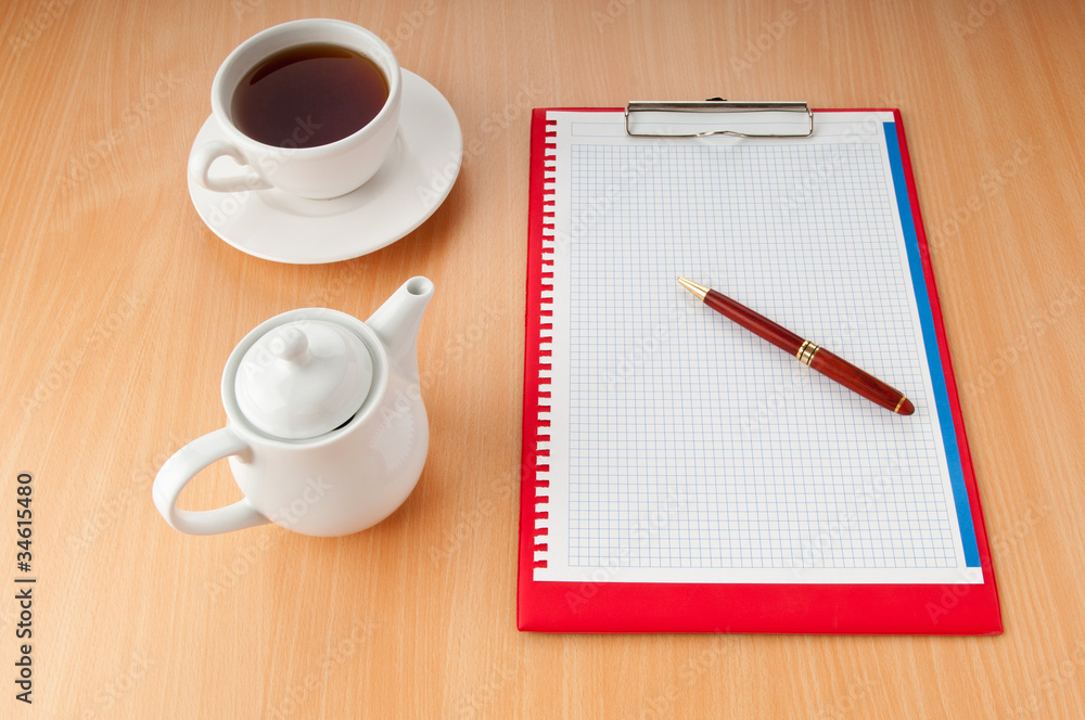 Binder with blank page and tea Binder with blank page and tea