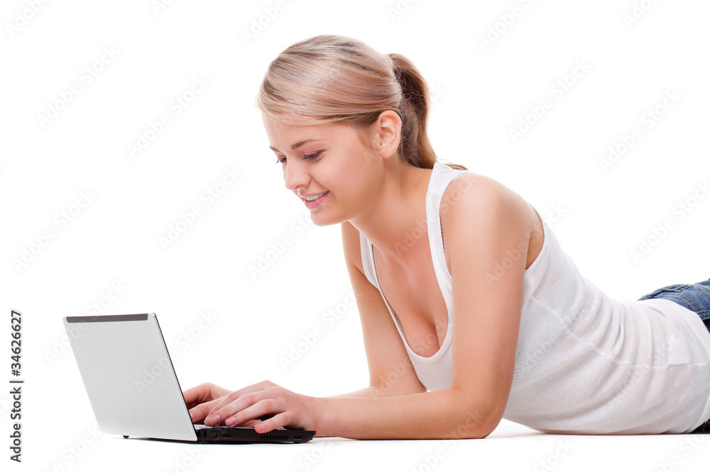 woman laying on the floor with laptop woman laying on the floor with laptop