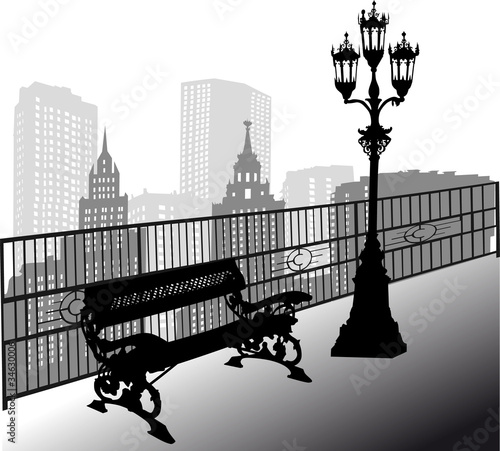 bench and street lamp in city