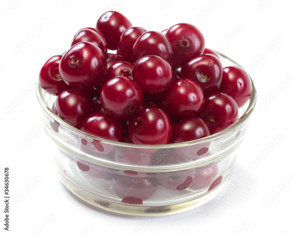 Bowl with ripe cherries. Isolated on a white background. Bowl with ripe cherries. Isolated on a white background.