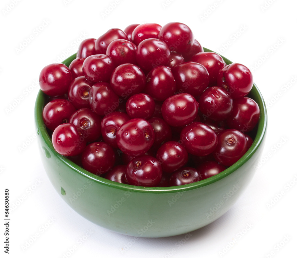 Bowl with ripe cherries. Isolated on a white background. Bowl with ripe cherries. Isolated on a white background.