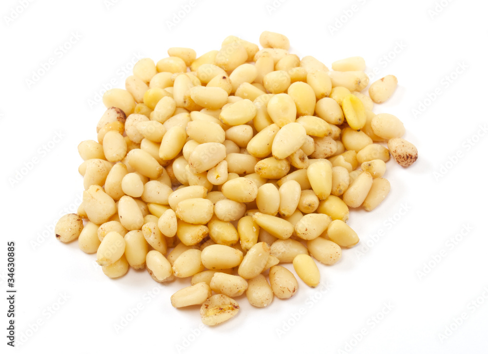 Cedar Pine nuts on a white background Cedar Pine nuts on a white background