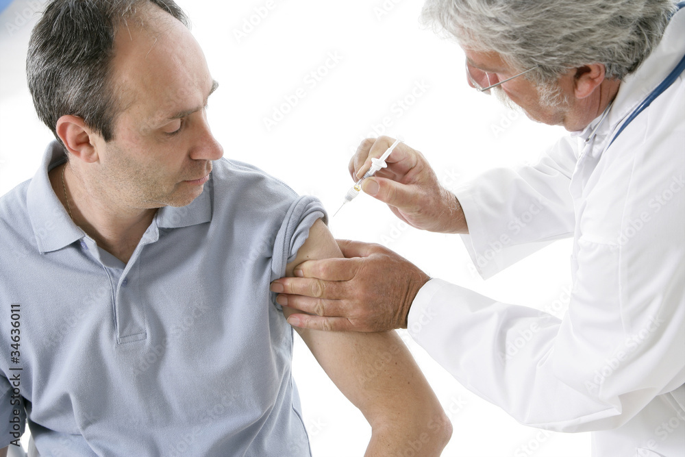 Vaccination d'un homme Vaccination d'un homme