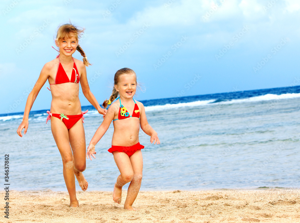 Children  playing on  beach.