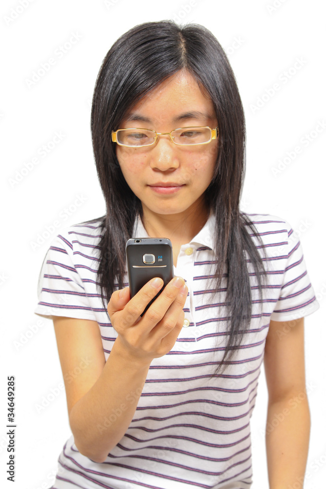 Young chinese woman talking in mobile phone Young chinese woman talking in mobile phone