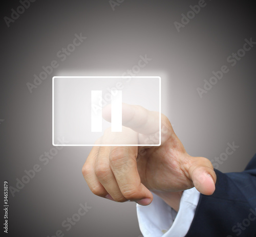 Business hand press pause button